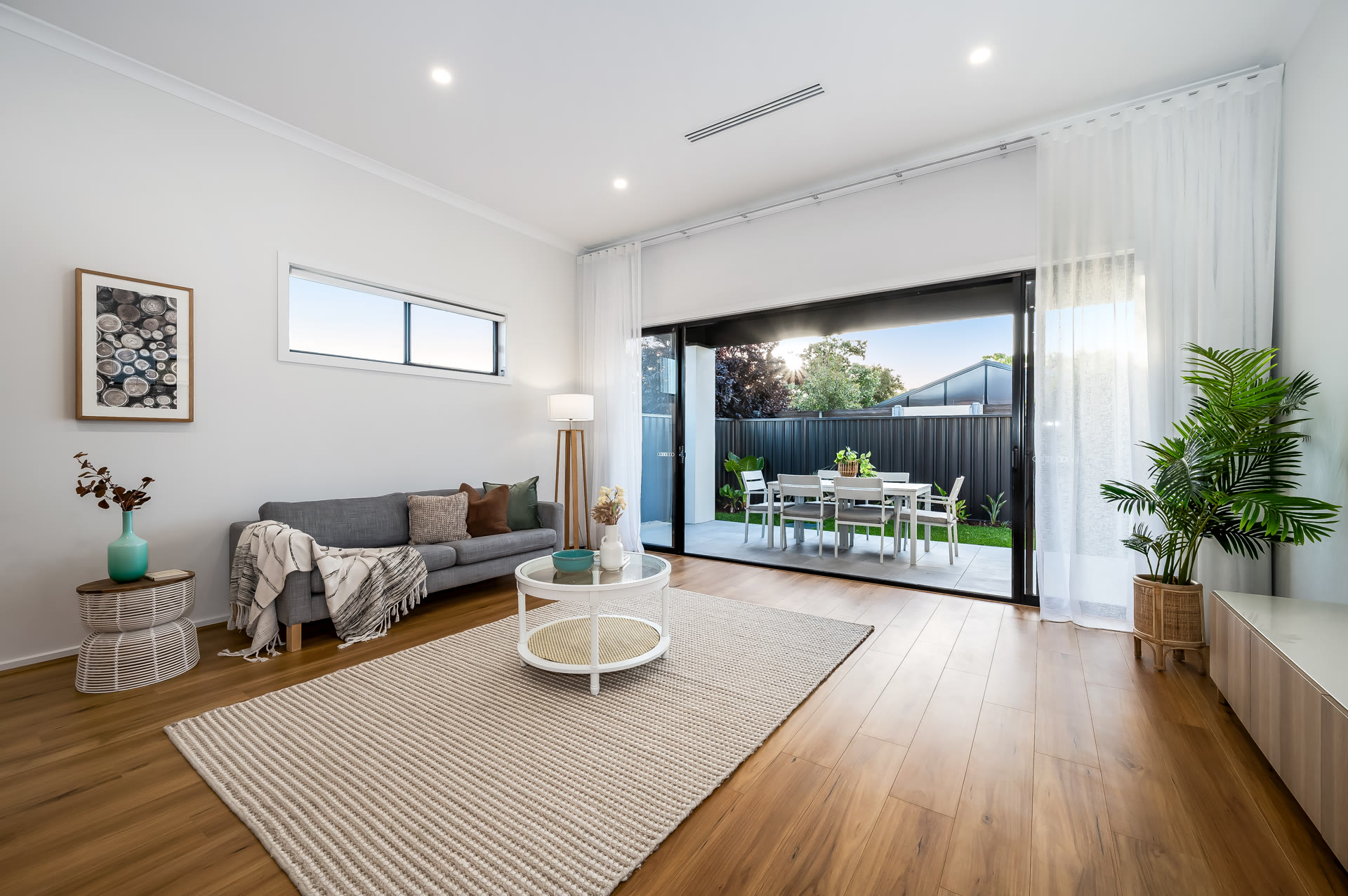 Living area opening to the alfresco of a home sold by Clinton Barker