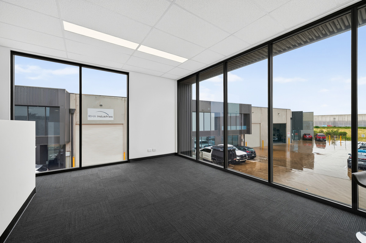Mezzanine office with full-height windows