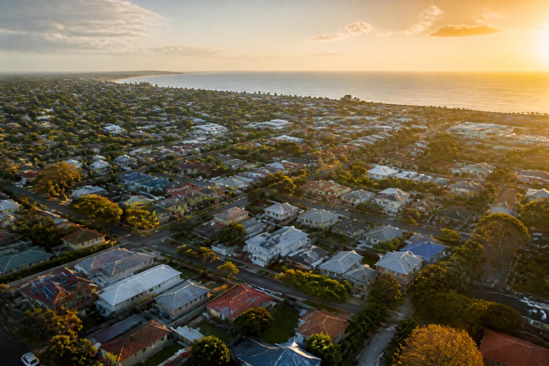 Aerial view over a suburb during a campaign